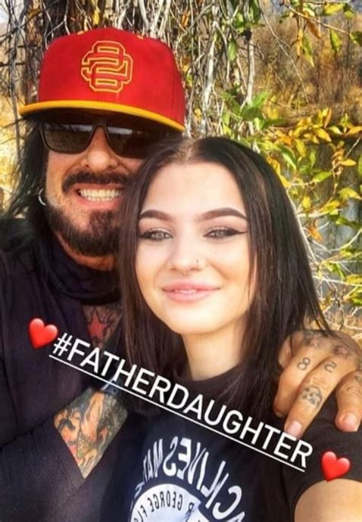 Dad Nikki Sixx with his daughter