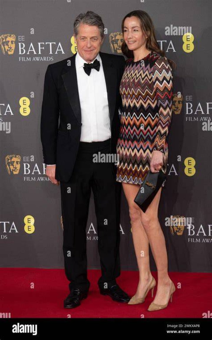 Hugh Grant and Anna Eberstein