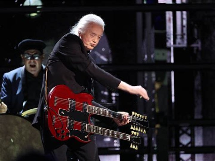 Jimmy Page playing guitar Jimmy Page playing guitar