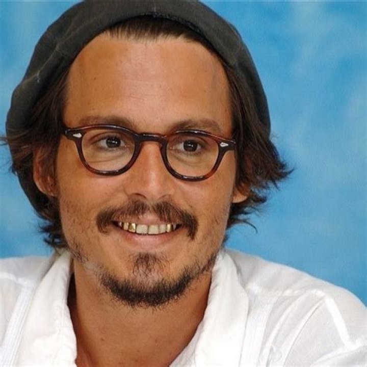 Johnny Depp with his gold teeth at the Tourist Premiere in Tokyo in 2011.
