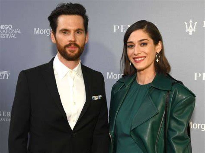 Lizzy Caplan and her husband Tom Riley enjoy a lovely evening out with their adorable pooch in West Hollywood